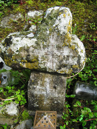 Cross on the well